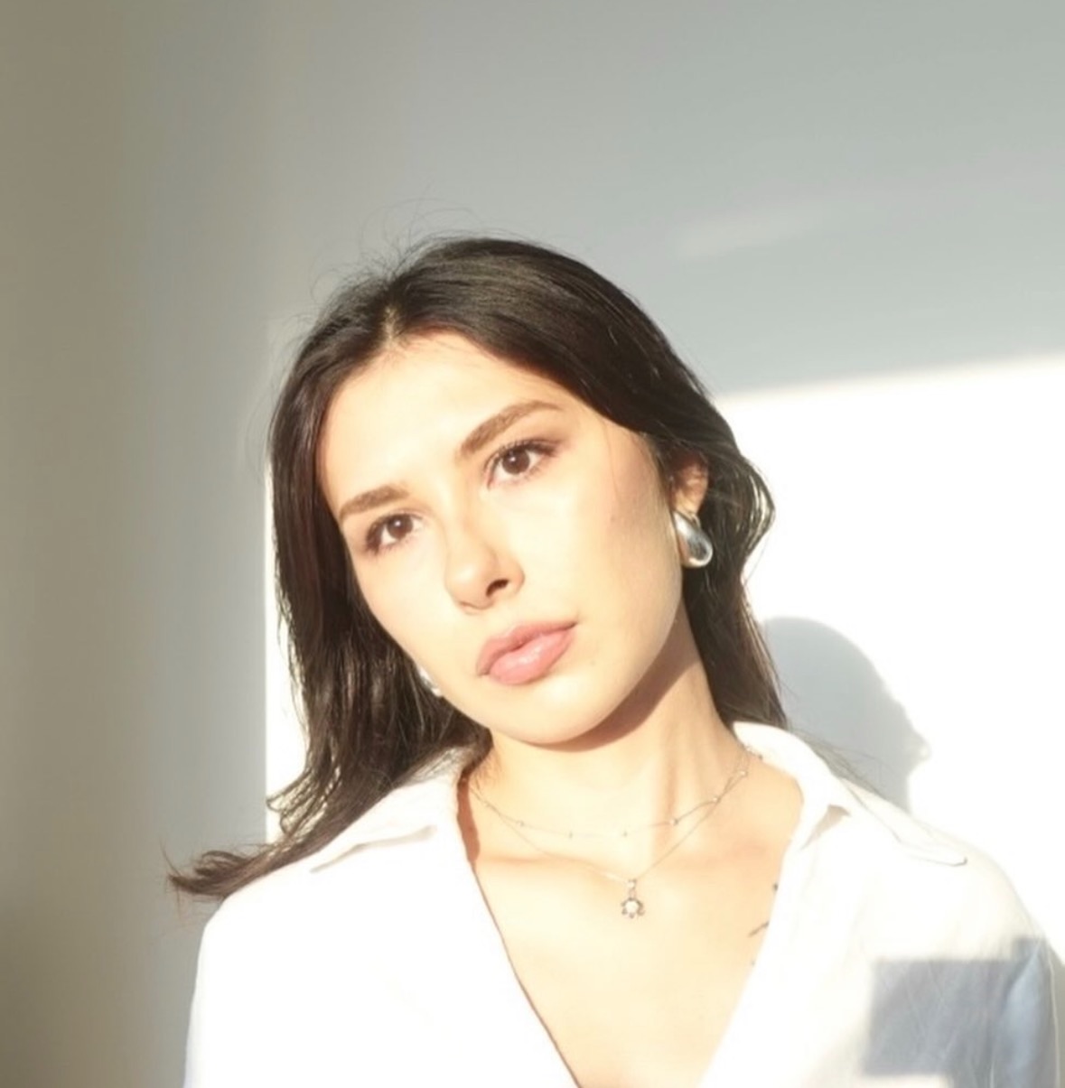 Öykü Kosma, lead UX designer, in a sunlit room